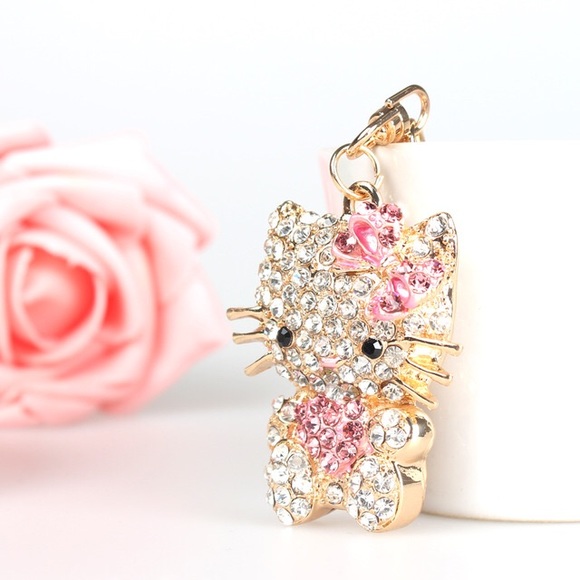 Hello Kitty w/ Heart Crystals on a Gold Keychain - Picture 1 of 16